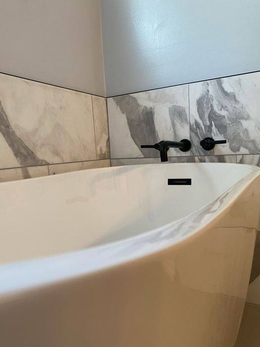 Wall-mount black tub faucet